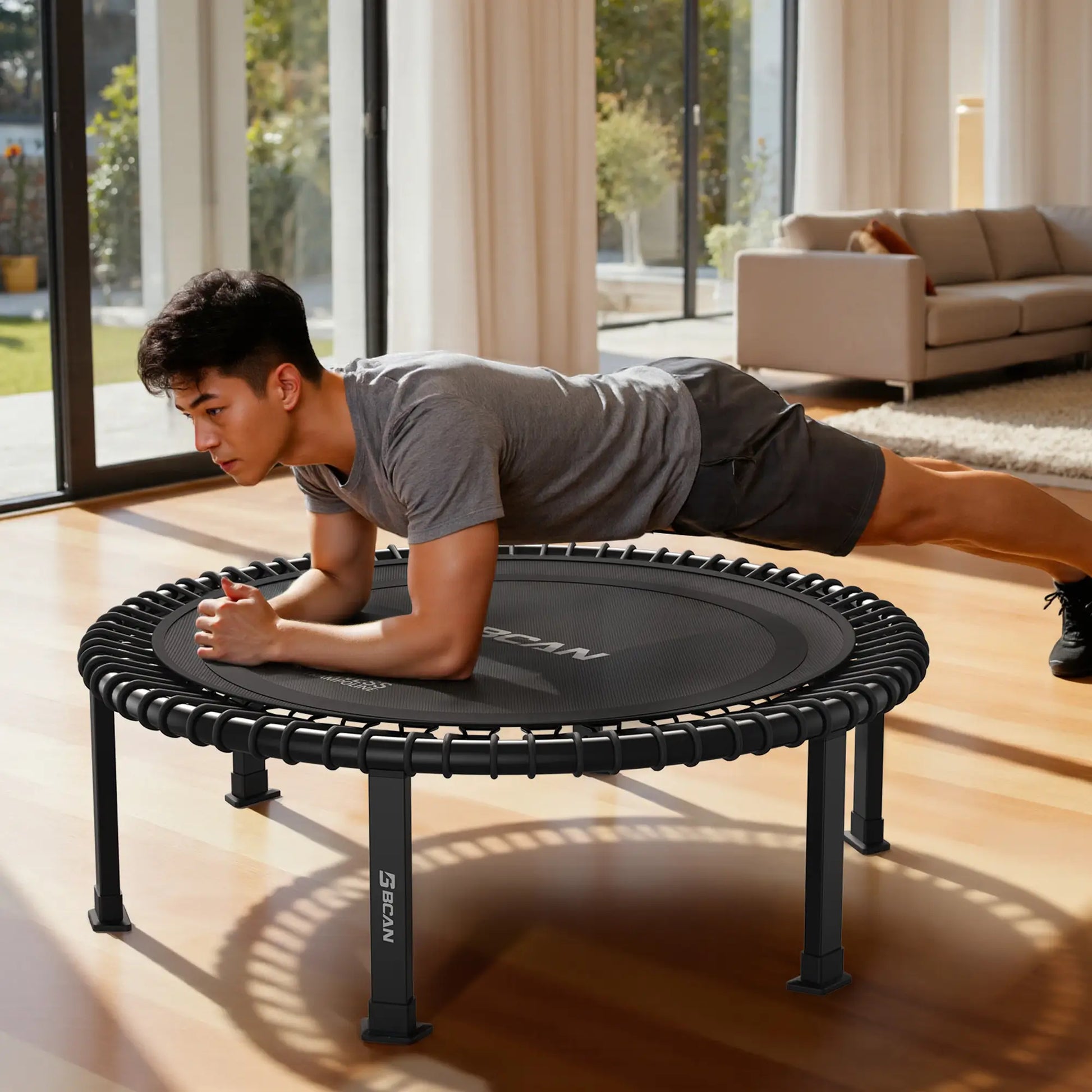 Person exercising on a rebounder in a home setting